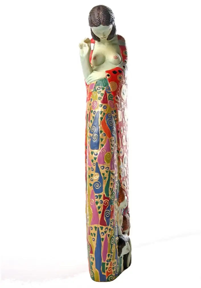 Front view of Klimt-inspired pregnant figure sculpture featuring bold colorful motifs