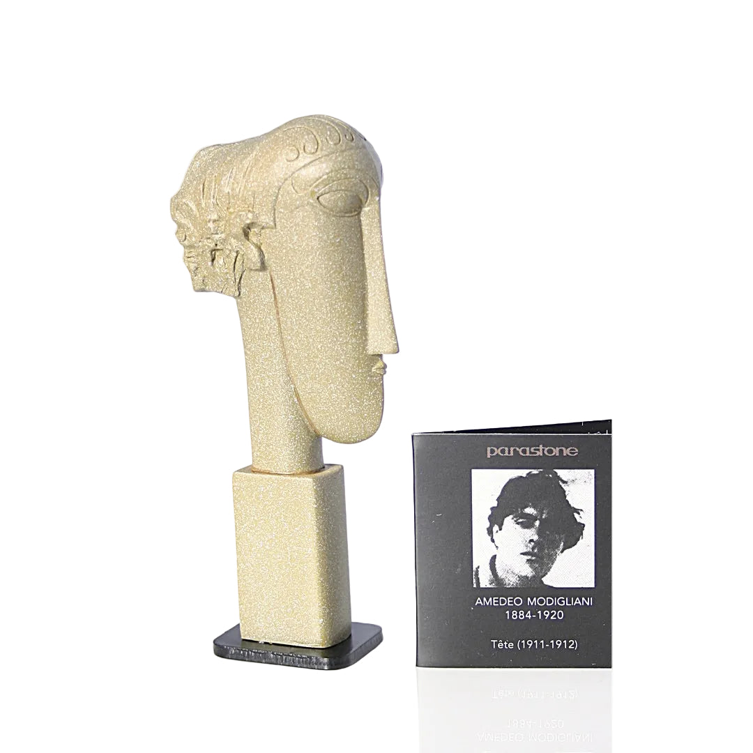 Modernist Modigliani-style female stone head miniature on slim black base.
