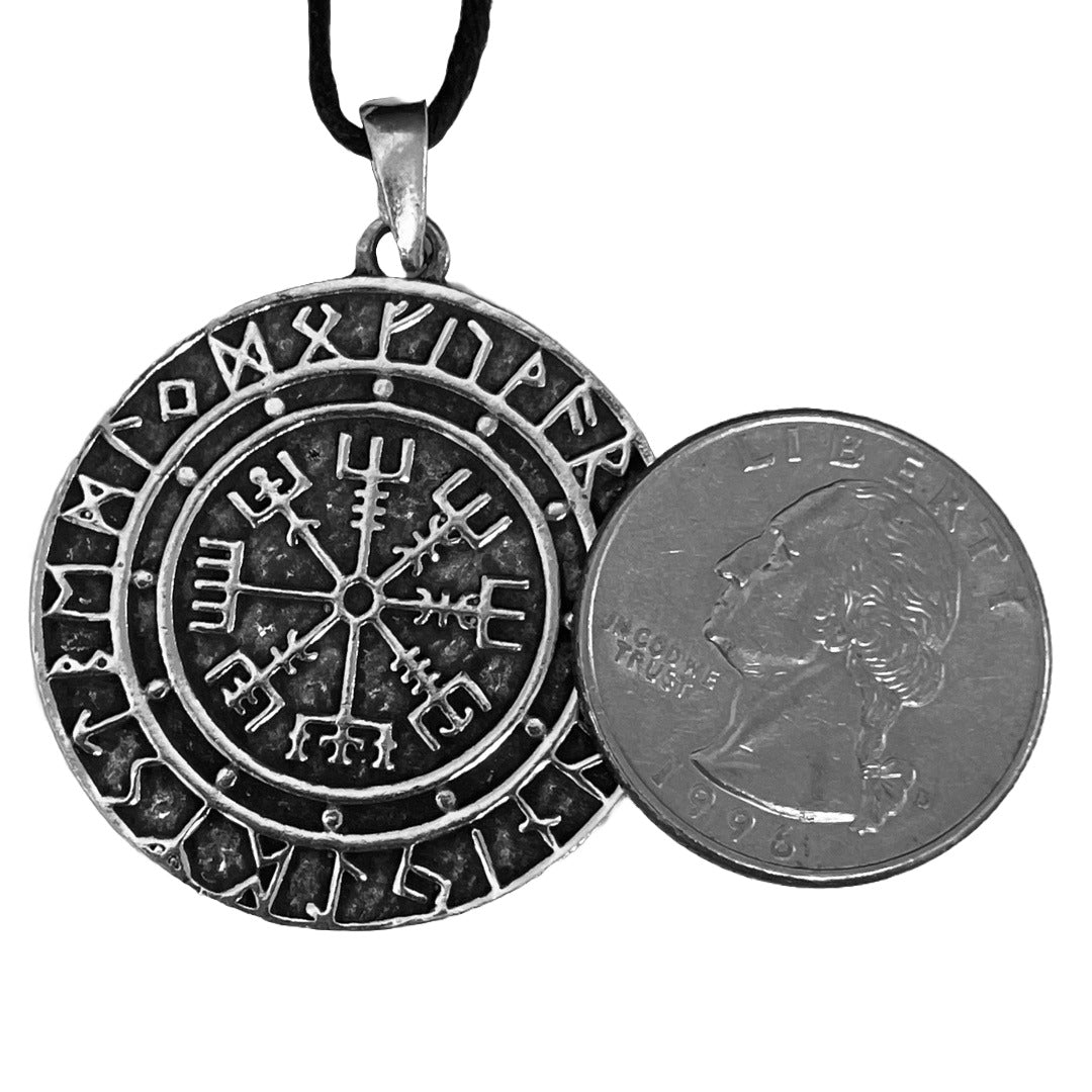 Vegvisir pewter pendant shown for scale next to a quarter