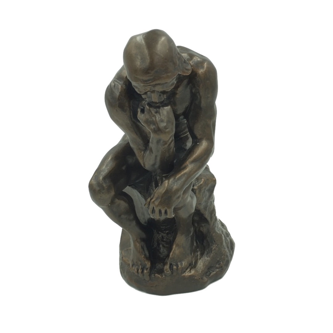 Head on view of Rodin The Thinker seated pose large statue
