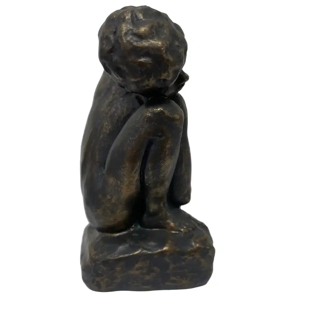Side view Rodin crouching woman replica, small scale study for the Gates of Hell in France