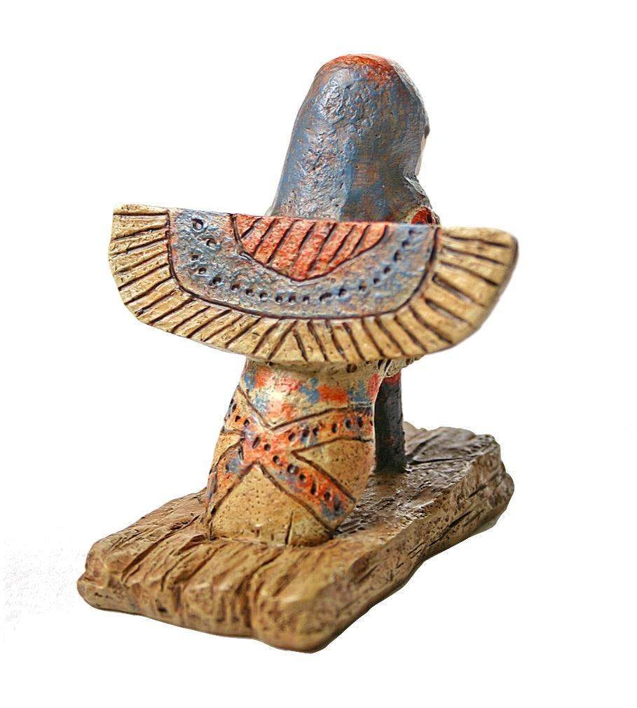 Back view of Egyptian Ba bird statue showing human-headed bird form with outstretched wings and faux wooden base