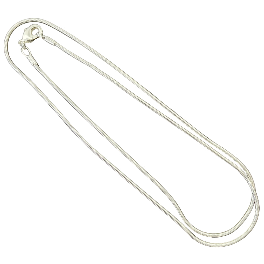 Silver chain necklace on a white background