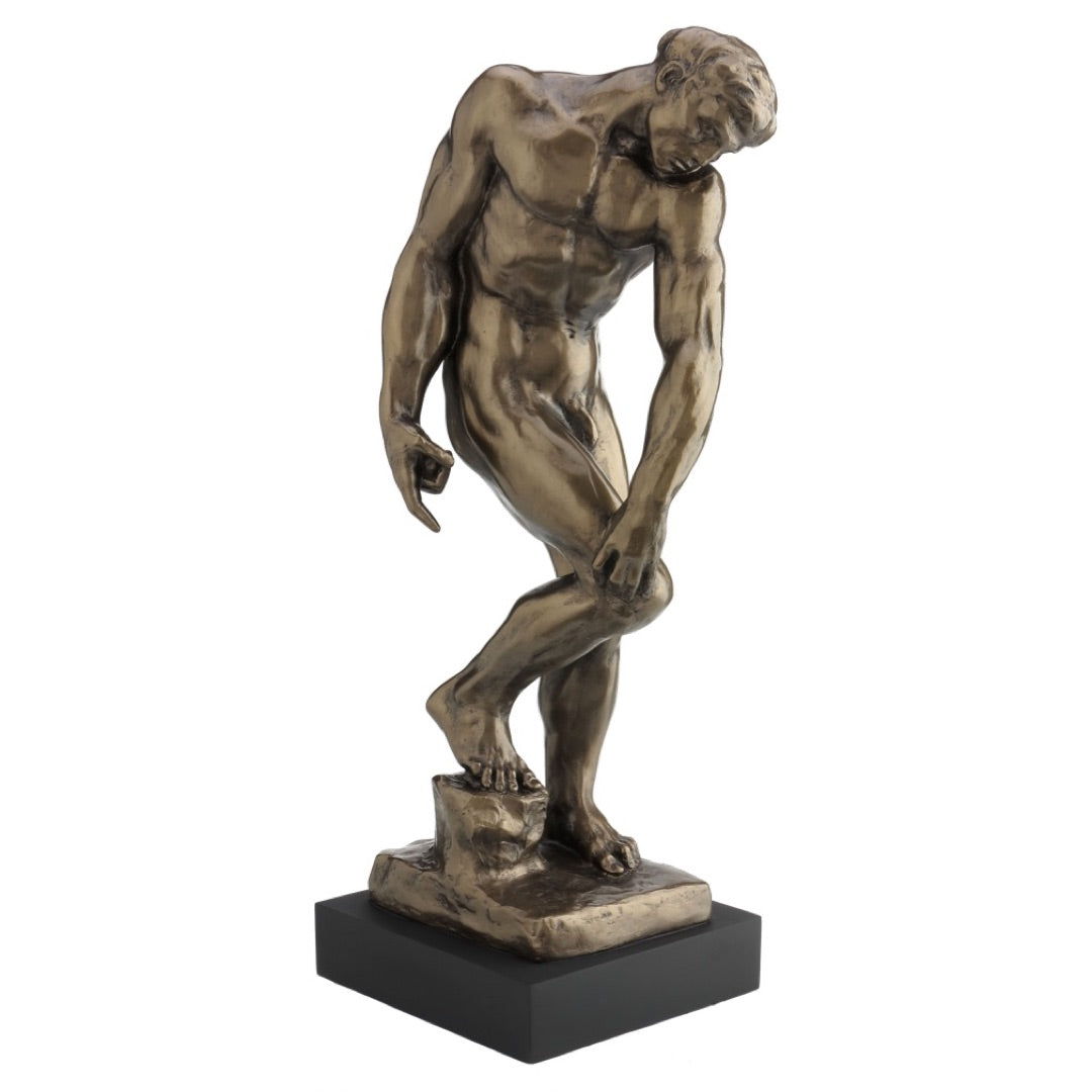 Close-up detail of Adam statue head and facial expression by Rodin