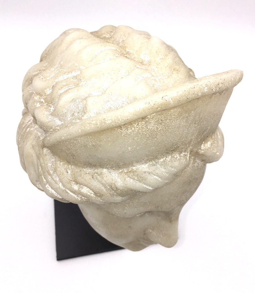 Top view Aphrodite classical bust statue without stand showing bonded stone base and marble surface texture