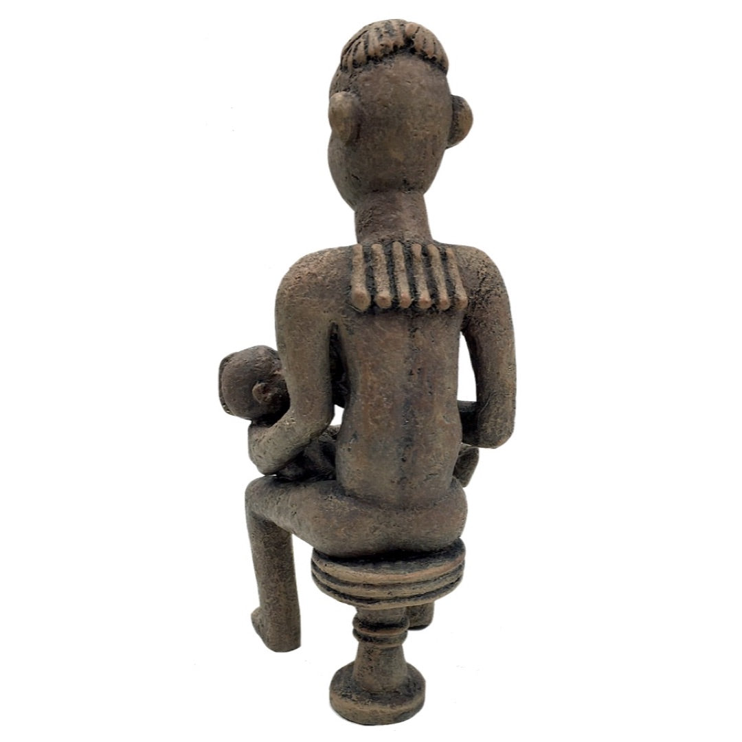 Full back view of African mother of twins statue AFR01, Bangwa Anyi figure showing hairstyle, shoulder necklace, and ornate pedestal stool, Parastone African Collection