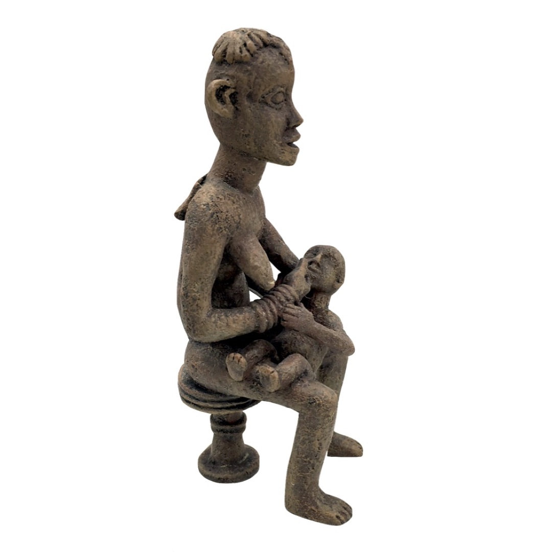 Side view African Mother and Child statue, modern replica