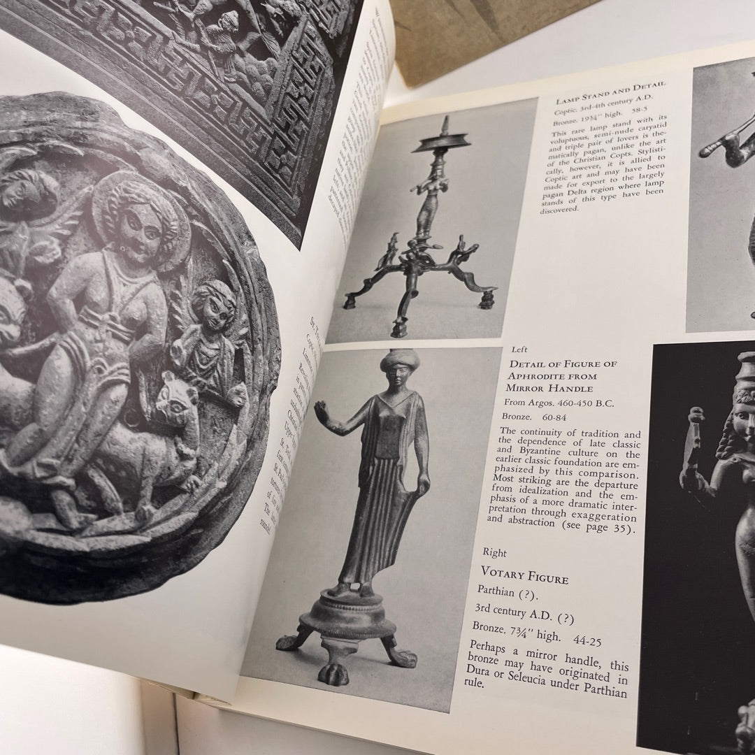Nelson-Atkins handbook set with global art in Volume 1 and Asian art in Volume 2.