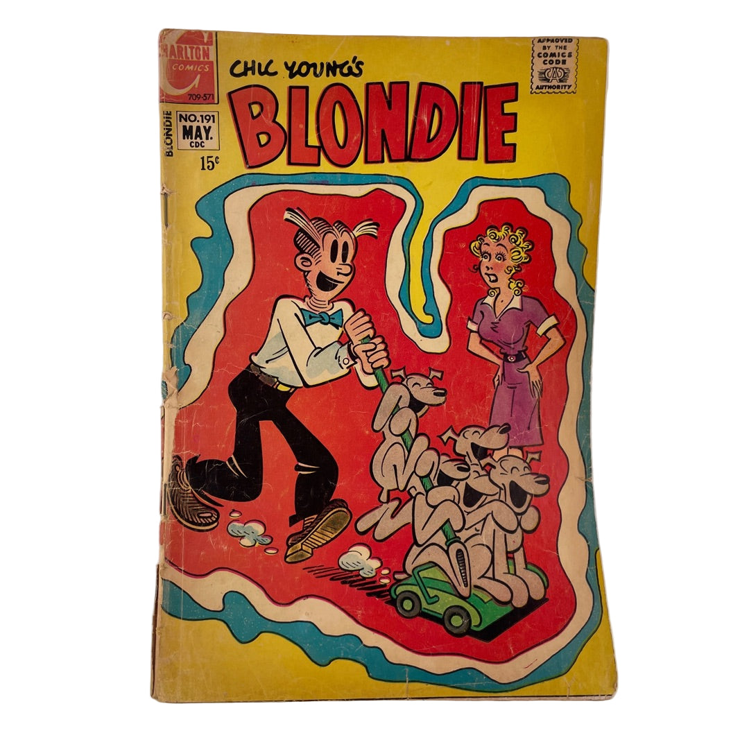Vintage comic book cover featuring a cartoon character and woman with dogs on a yellow background