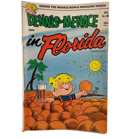 Comic book cover featuring Dennis the Menace in Florida with a beach scene and palm trees.