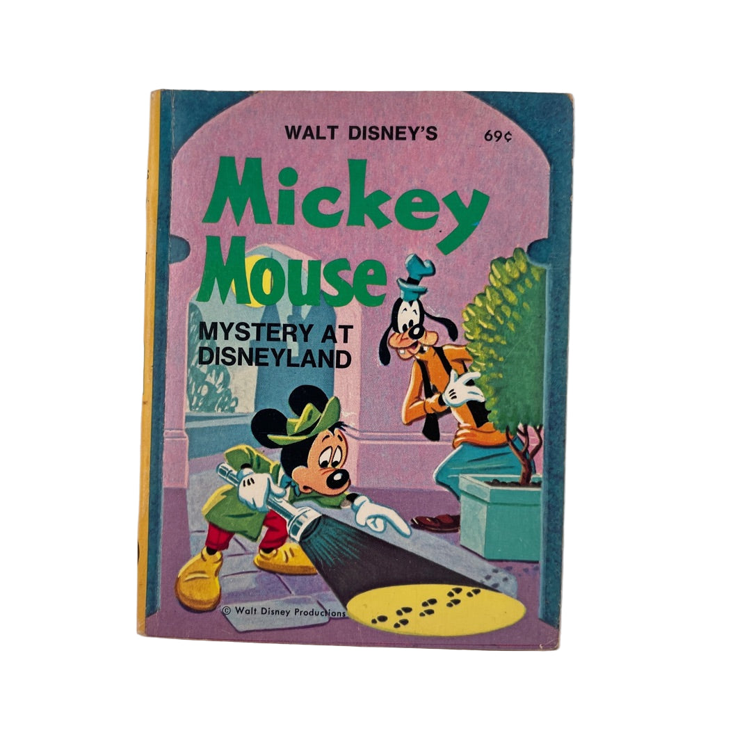 Vintage Disney book cover featuring Mickey Mouse and Goofy investigating Mystery at Disneyland