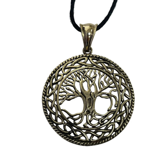 A circular tree of life pendant necklace with an intricate Celtic knot design and a black cord, shown against a plain light gray background.