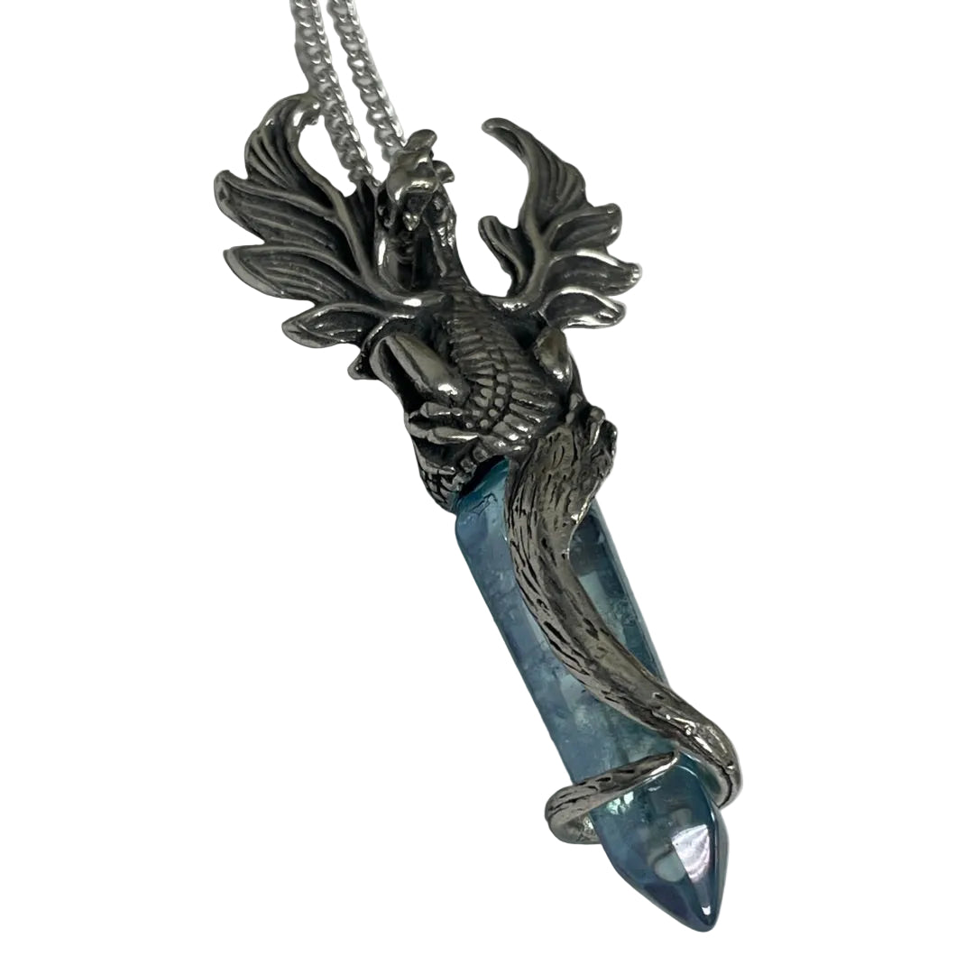 A silver-toned phoenix pendant necklace with a blue crystal point, shown on a plain light gray background.