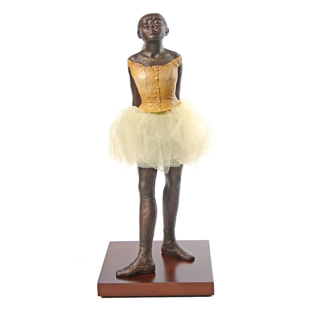 Large Degas ballerina statue showing realistic pose and fabric tutu.