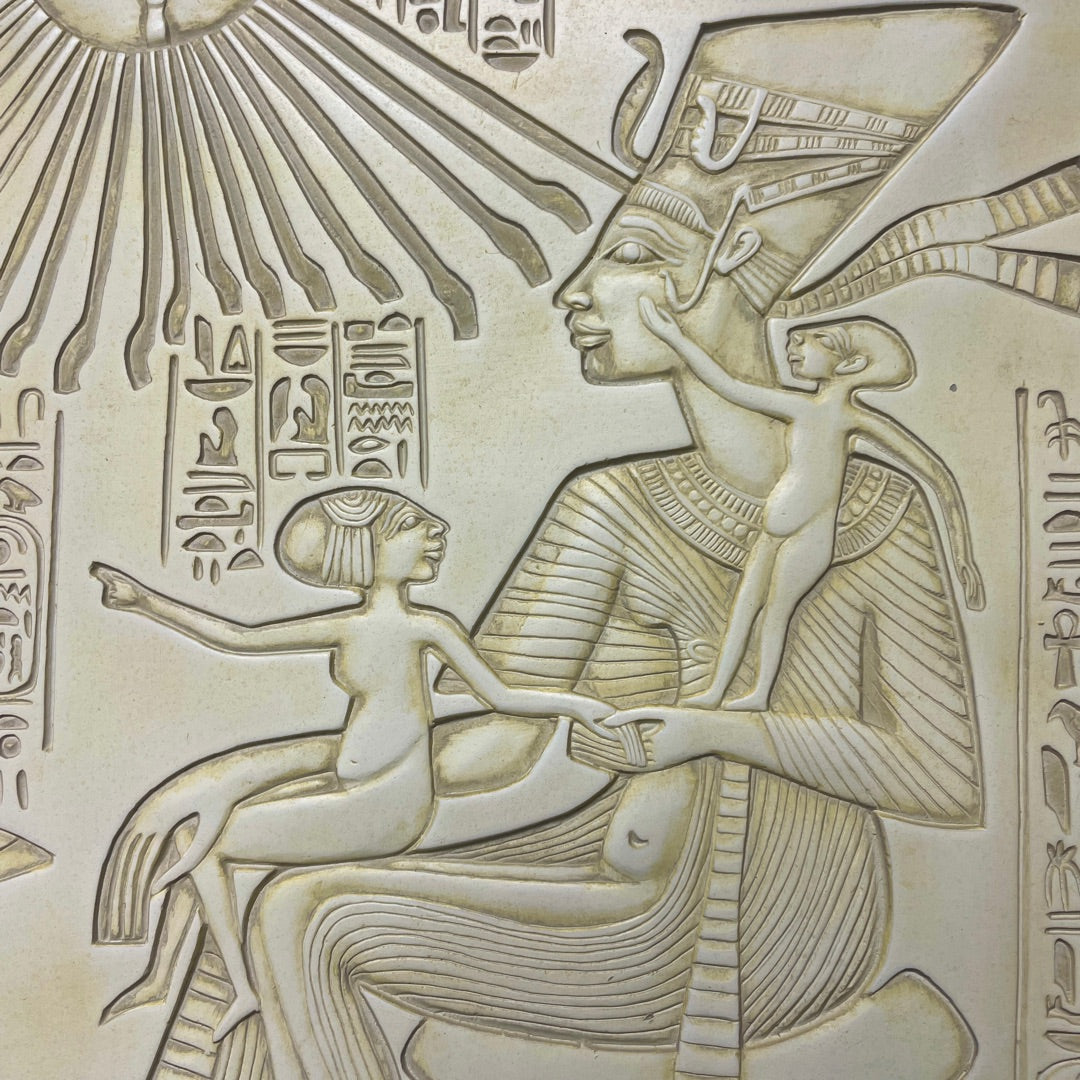 Decorative panel with Egyptian-style figures and hieroglyphs on a beige background