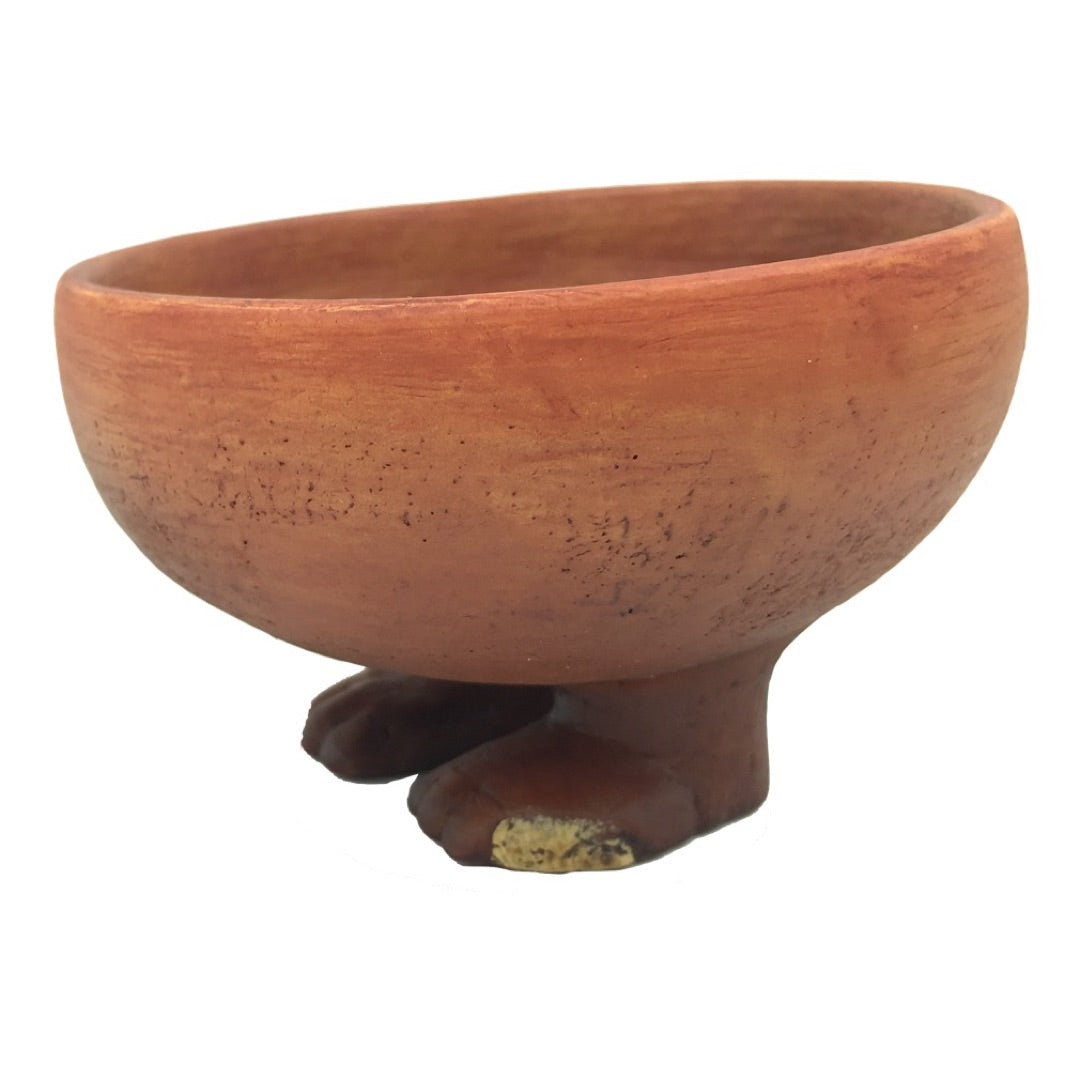 Ancient Egyptian bowl with human feet replica showing symbolic ritual design from early Egypt