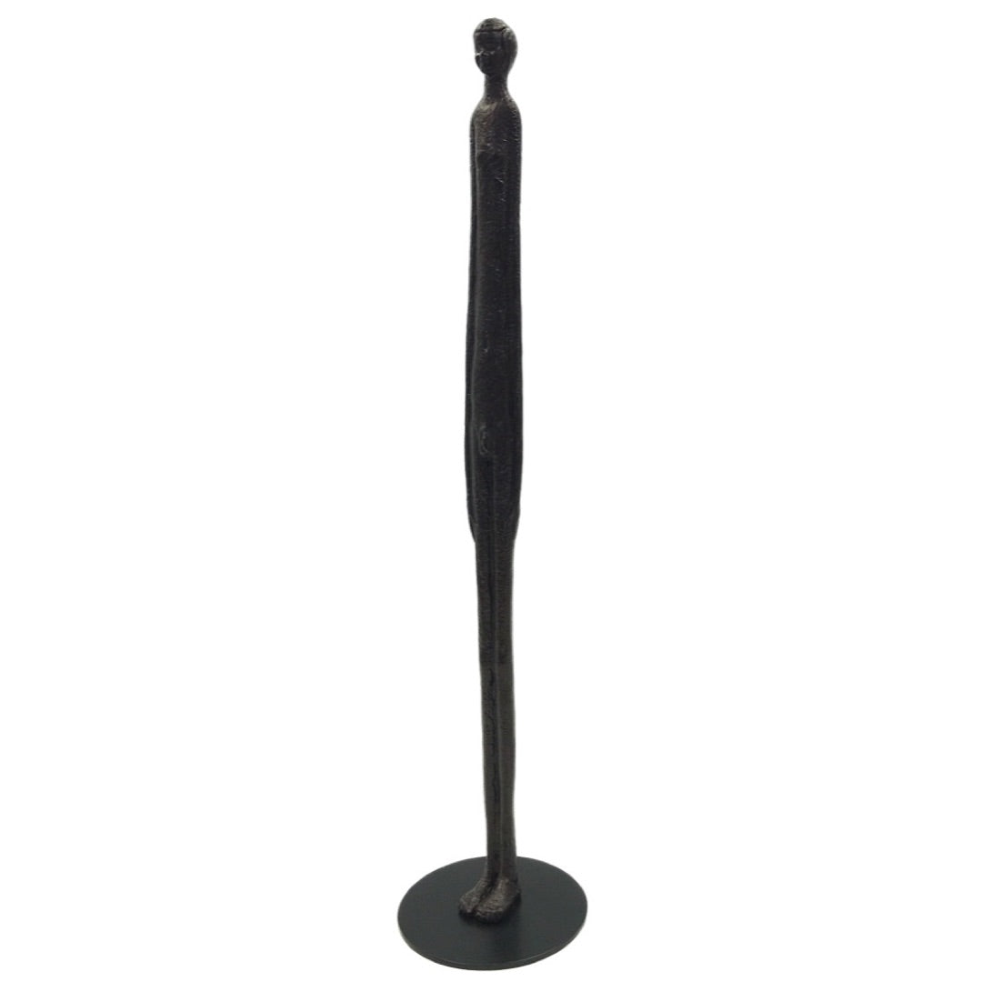 Etruscan boy thin statue with elongated body inspired by ancient Etruscan bronze figures, mounted on round base