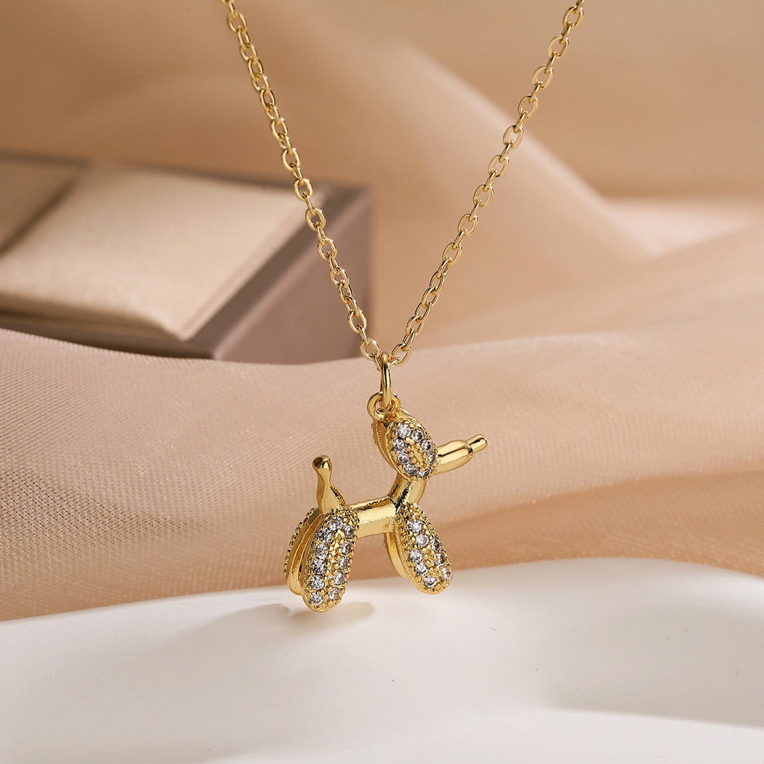 Gold dog-shaped pendant necklace for dog collectors, balloon dog