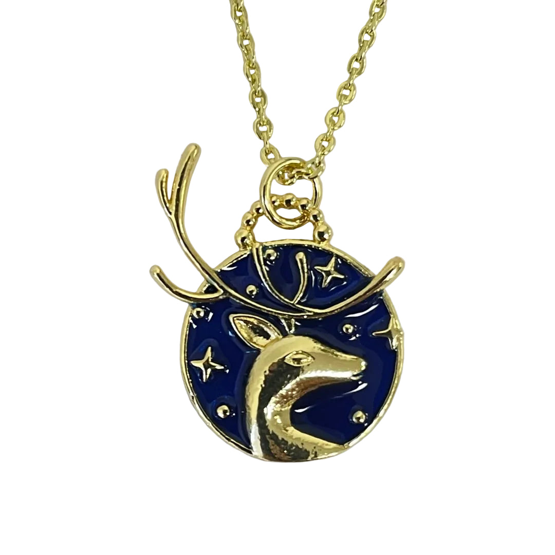 Artemis stag necklace pendant with gold-plated deer and crescent moon on blue enamel background
