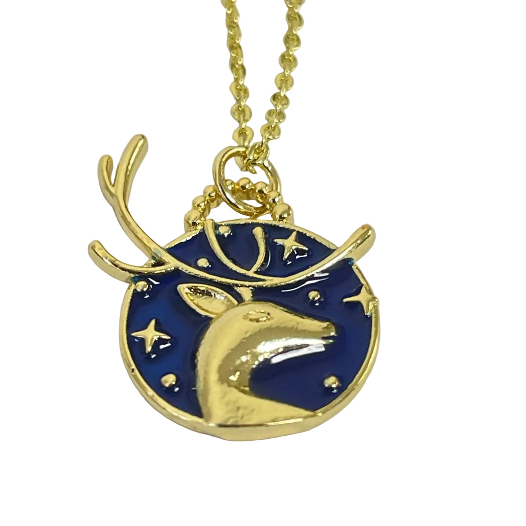 Three-dimensional stag antlers protruding from the round blue pendant design