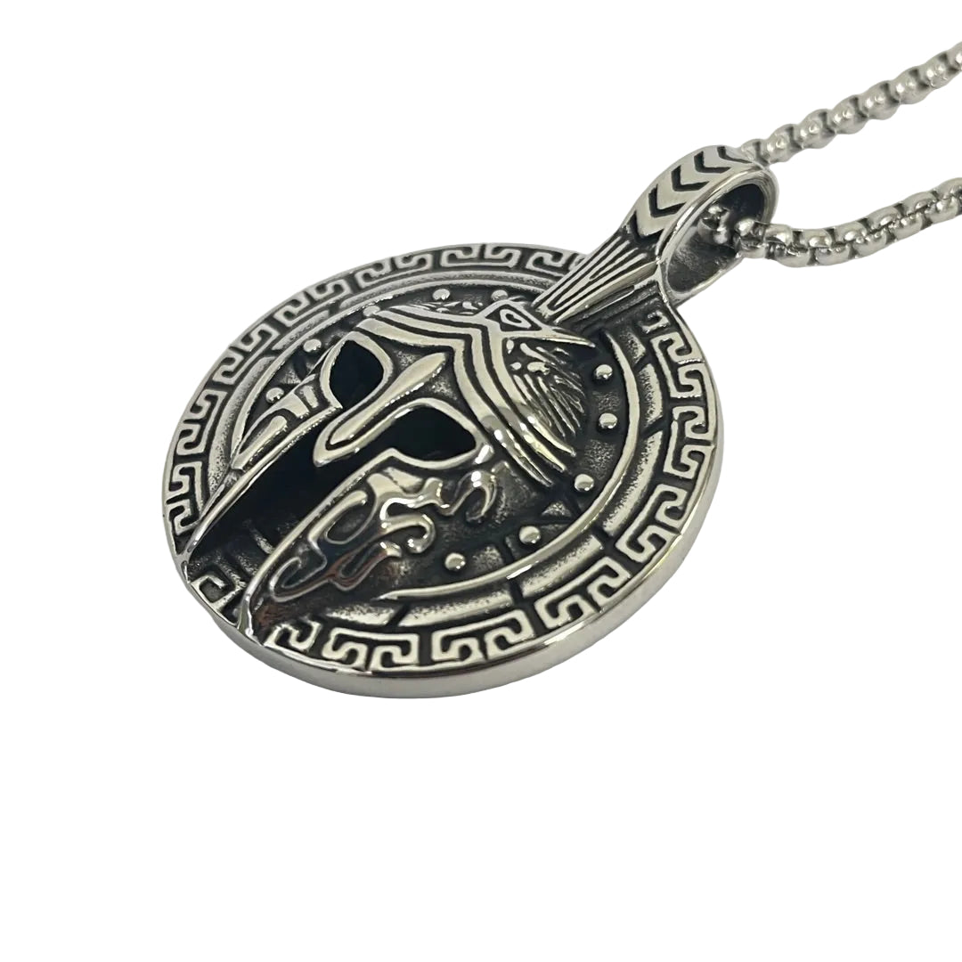 Greek key pattern border framing the Corinthian warrior helmet design