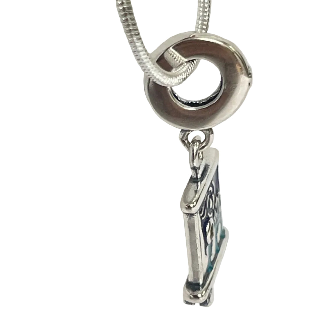 Side profile revealing three-dimensional depth of starry night charm