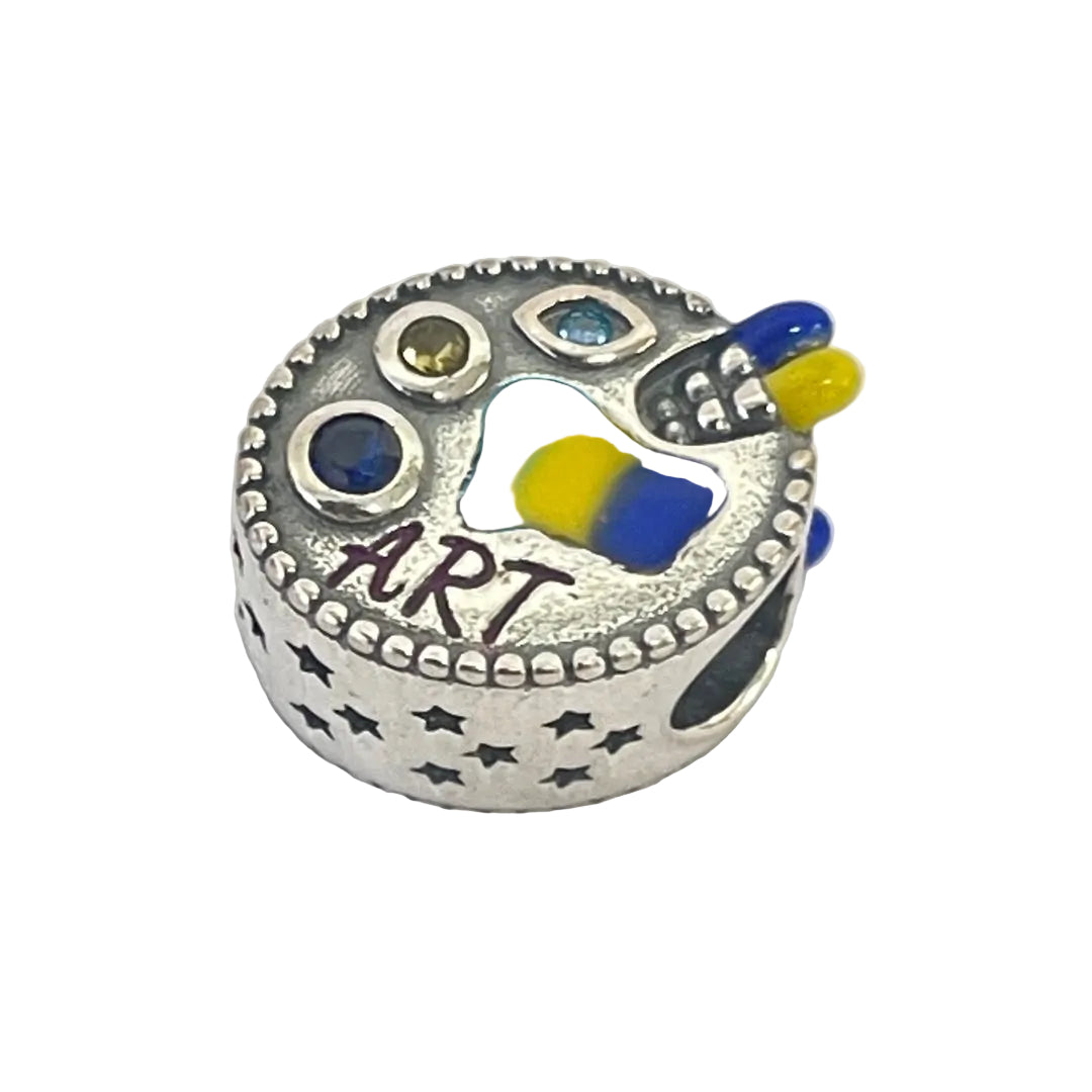 Artist palette charm bead featuring blue, yellow, and cyan gemstones in sterling silver
