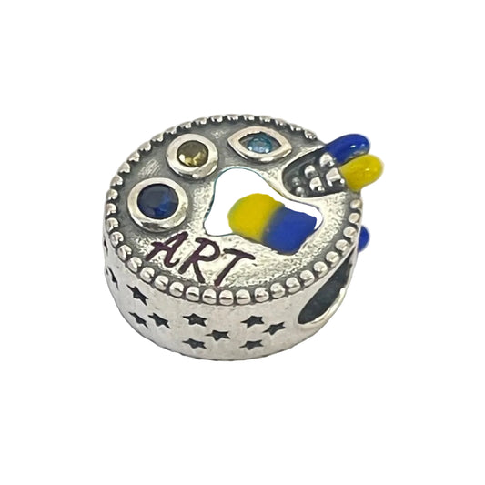 Artist palette charm bead featuring blue, yellow, and cyan gemstones in sterling silver
