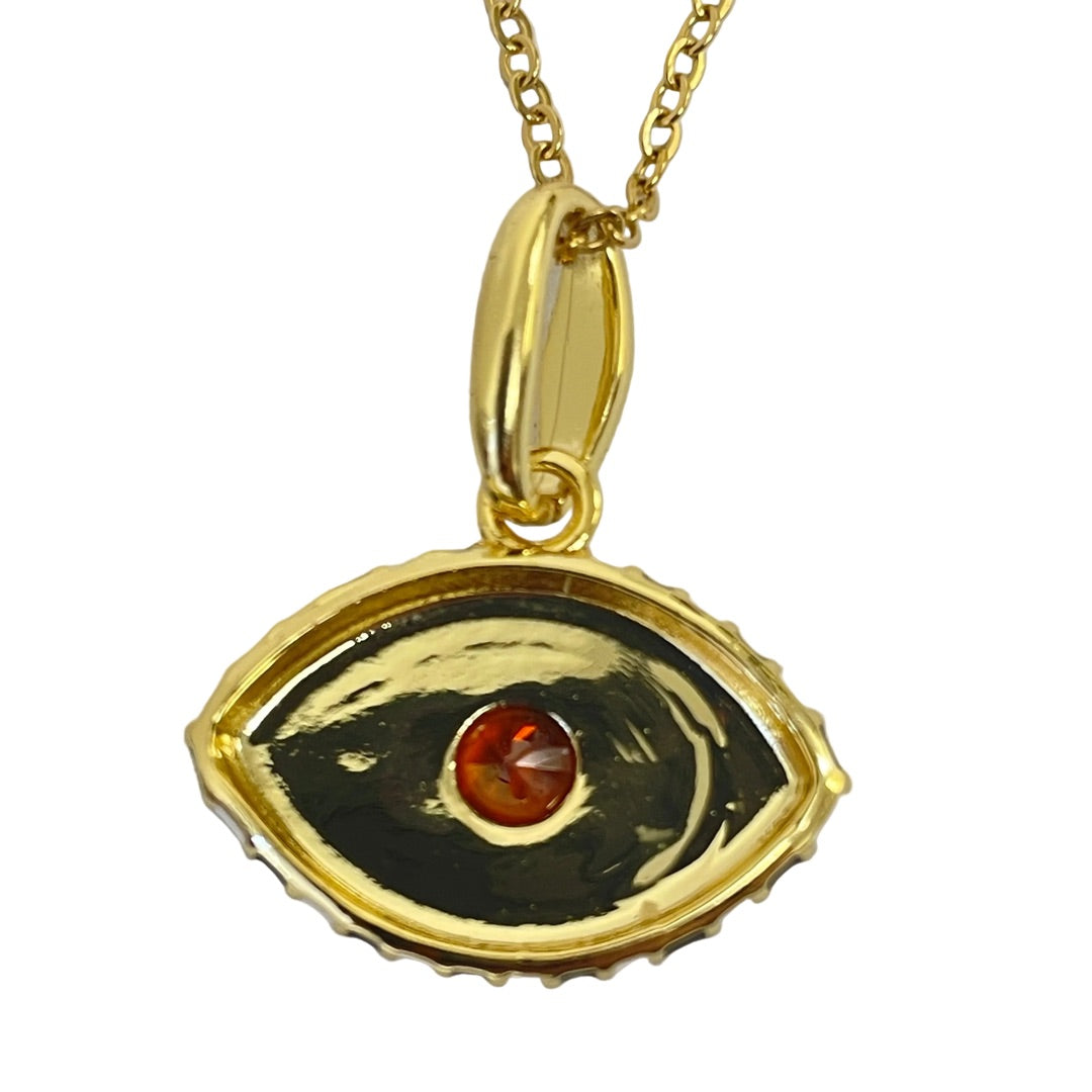 Mystical eye pendant featuring orange cabochon center stone