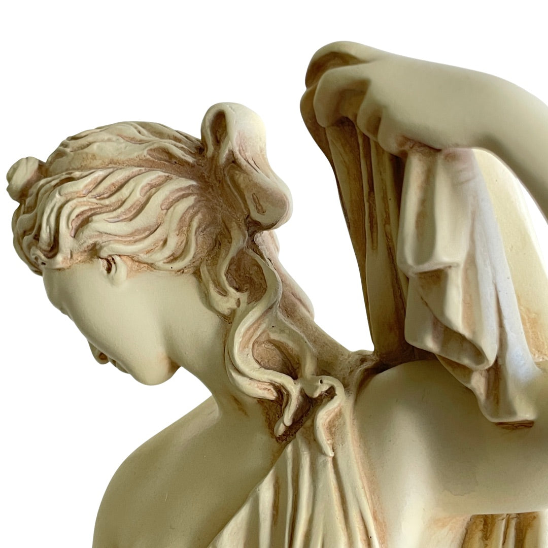 Close-up of the face and hair of the goddess