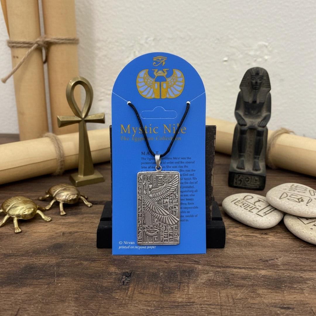 Maat necklace on table with other Egyptian relics