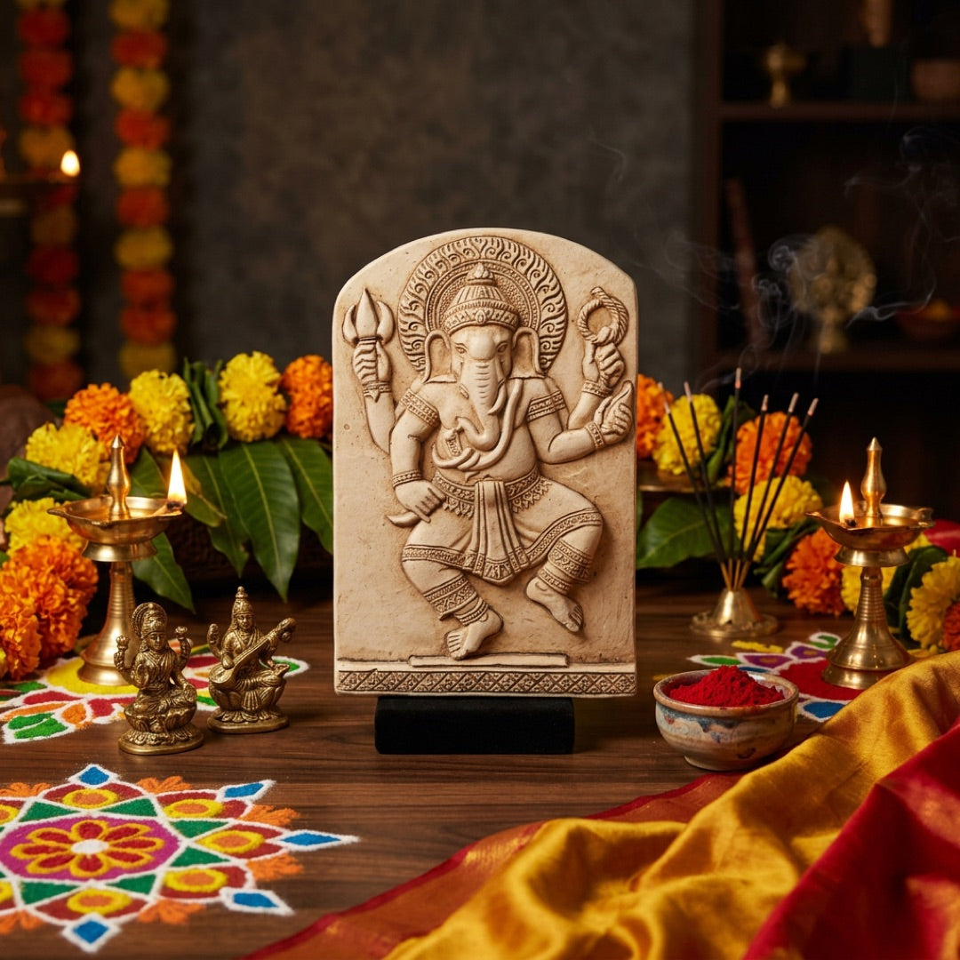 Ganesh Dancing Statue surround by Hindu celebration flowers and incense
