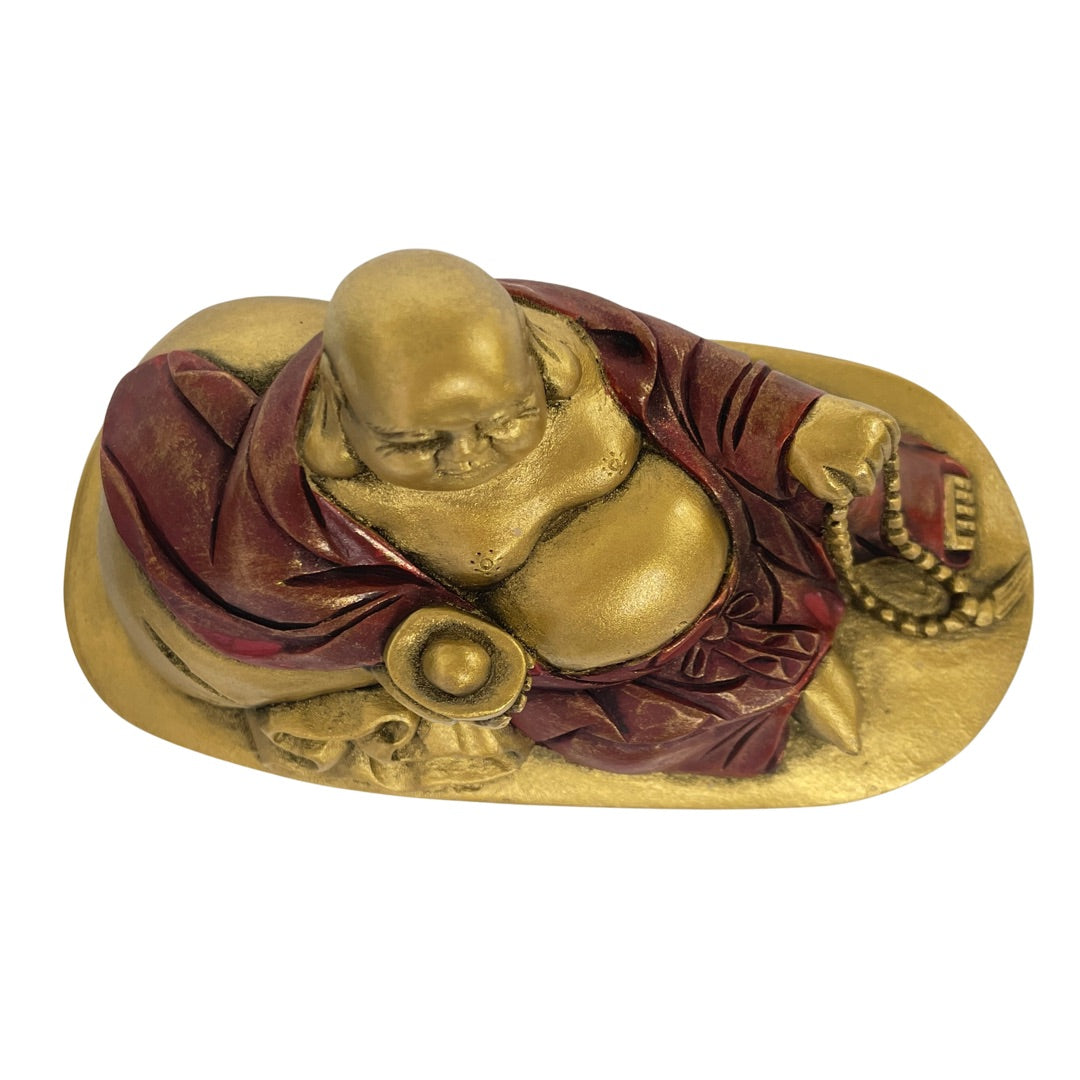Top view of the gold and red Budai statue