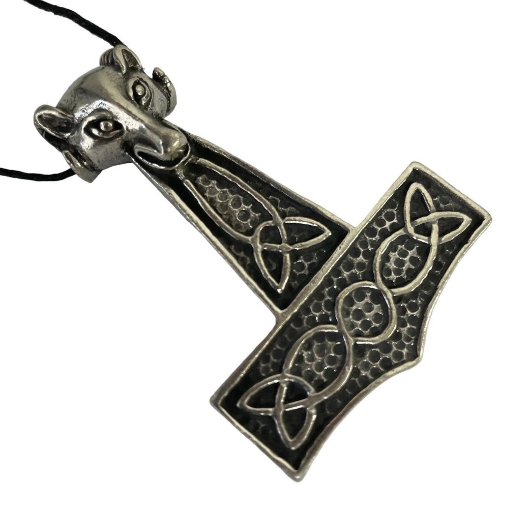 detail view shows depth of lion on pendant