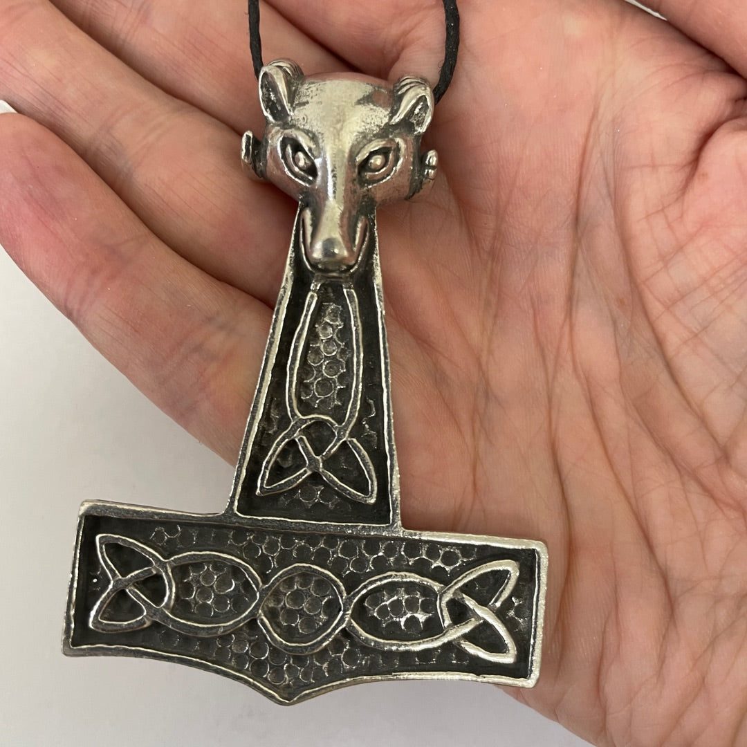 View in hand for scal of the knotwork on the Mjollnir hammer and the detailed ram's head
