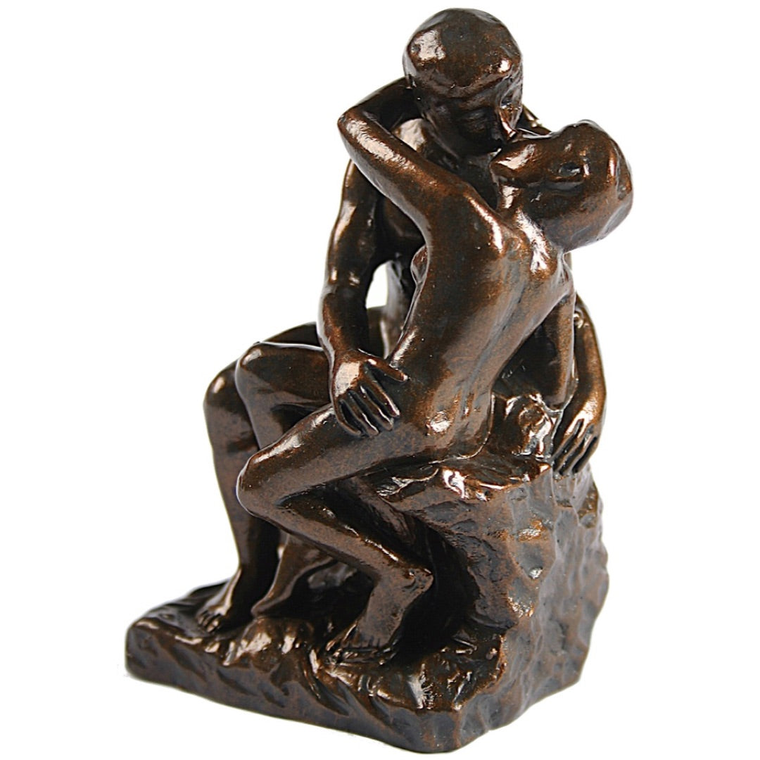 Miniature Rodin The Kiss bronze finish statue of embracing lovers.
