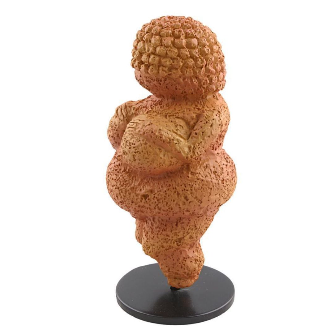 Side view small prehistoric Venus of Willendorf statue reproduction from the Parastone Museum Collection.