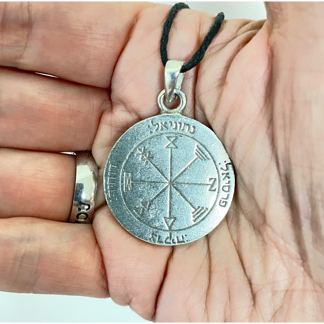Talisman Amulet show size compared to palm of hand
