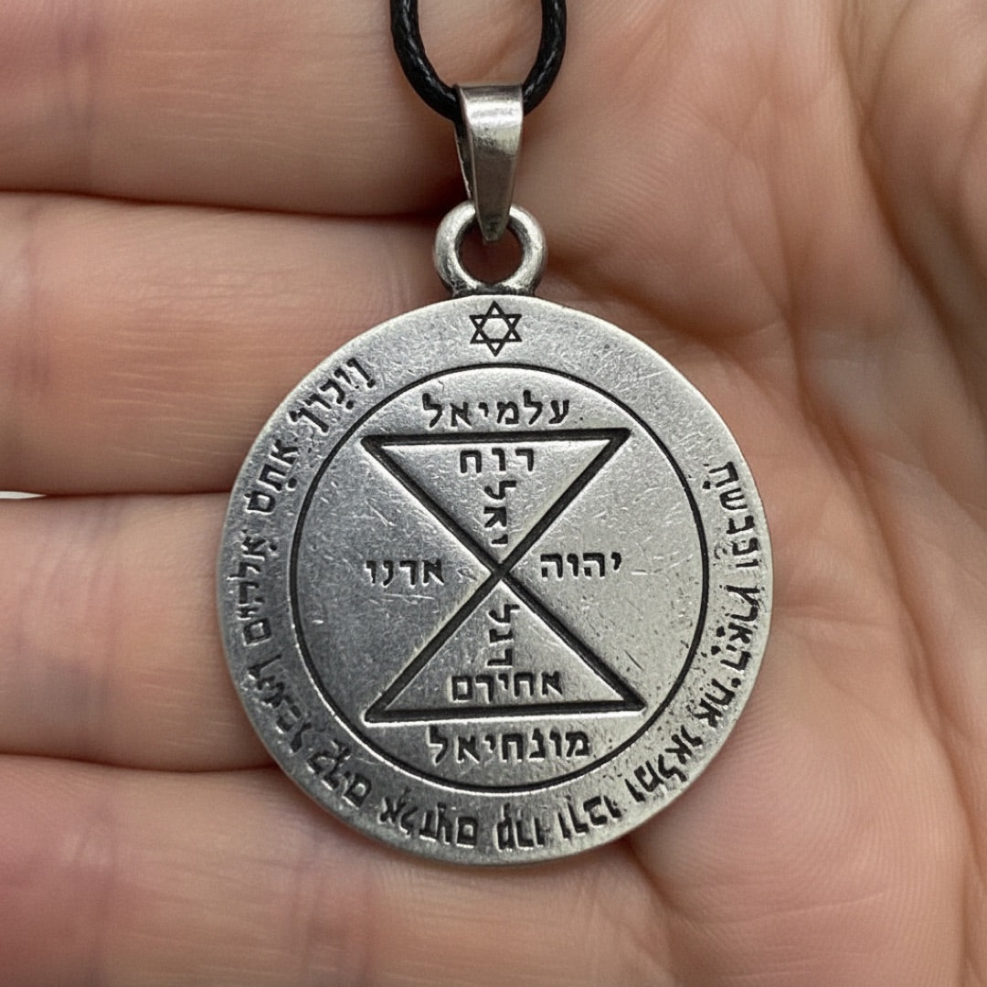 Close view of the angel Monachiel and divine names on the Third Pentacle of Venus in pewter