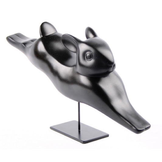 Running rabbit statue by François Pompon showing smooth modern animal form.