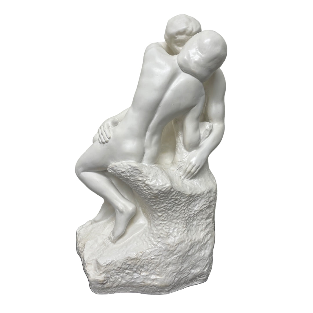 Back view Rodin The Kiss sculpture with lovers in a tender embrace.