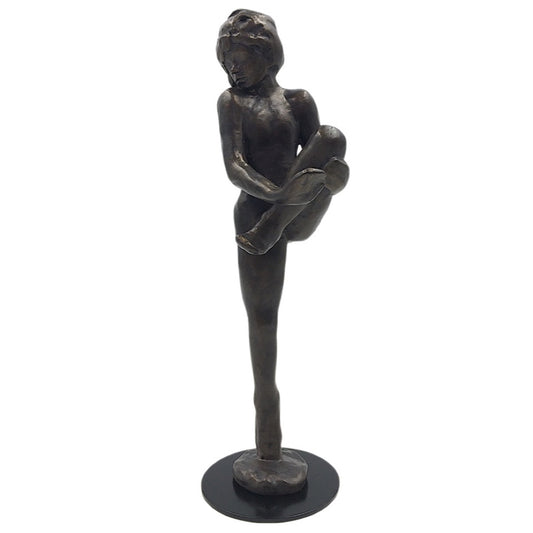 Bronze-finish Rodin dancer sculpture showing leg raised to chest, Parastone replica.