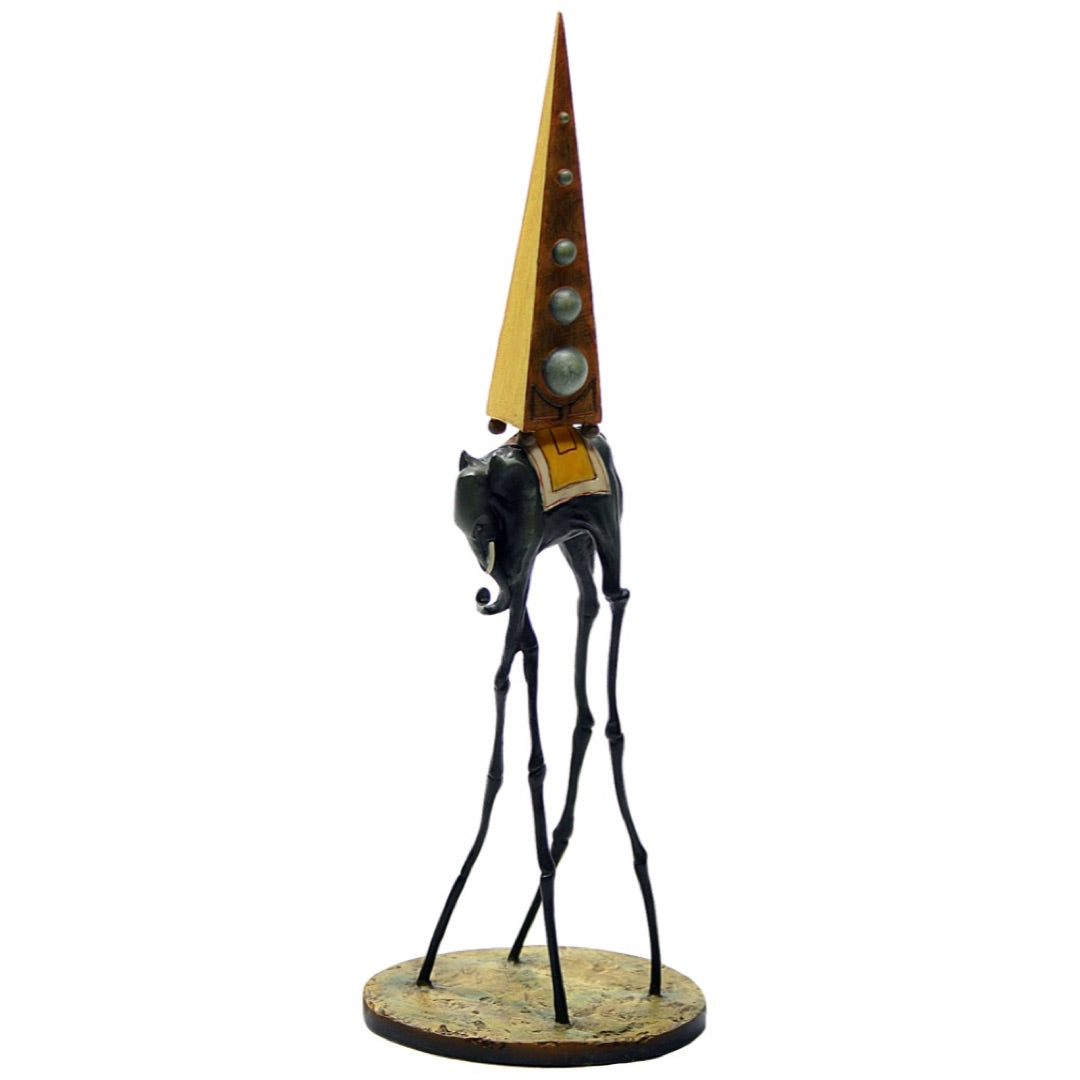 Front view of Dalí Elephant statue with surreal thin legs inspired by The Temptation of Saint Anthony.