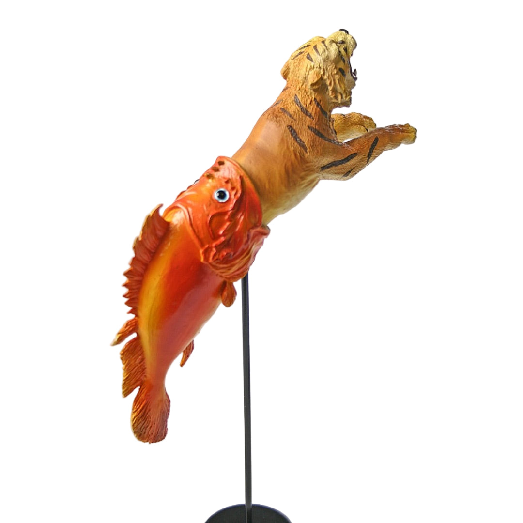 Back view of Dalí Dream Caused by a Bee sculpture on its metal detachable stand, displaying the tiger’s dramatic leap and the fish’s curved body.