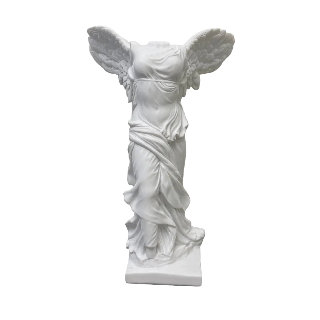 Nike goddess of victory Greek Roman statue replica, side view showing twisted torso and wind-blown drapery