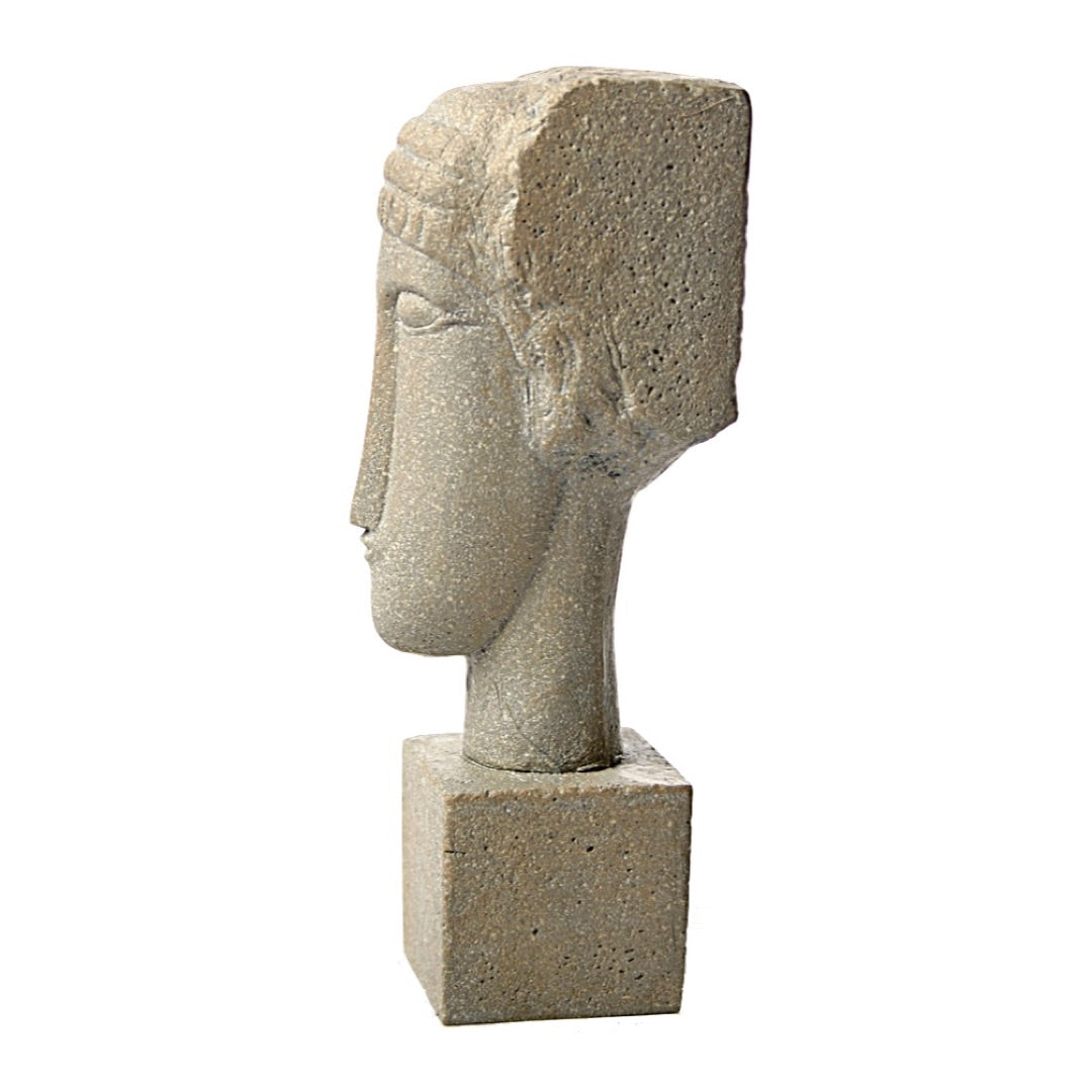 elongated Modigliani sculpture stone finish female portrait close detail