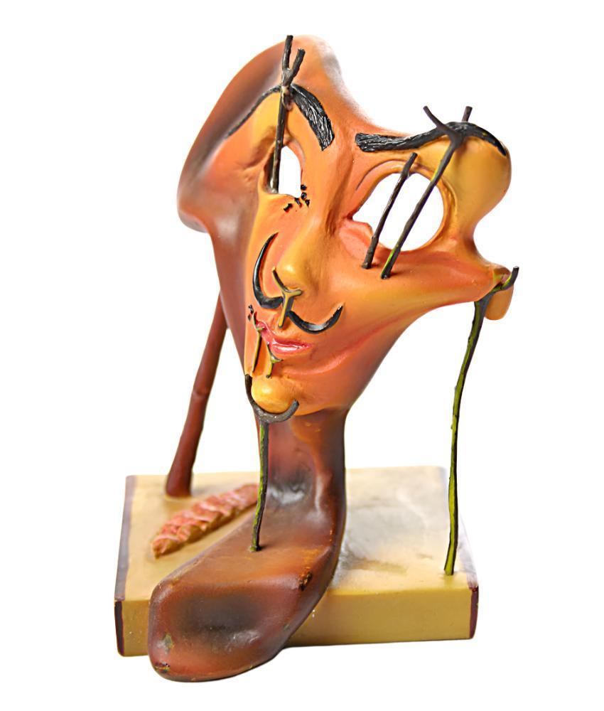 Side view of Dalí Self Portrait statue with melting facial profile.